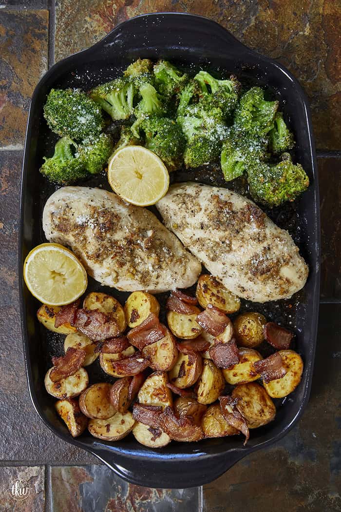 Skip the multi-pan cleanup with this Sheet Pan Garlic Parmesan Chicken! Features juicy garlic-butter chicken, crispy potatoes roasted in savory bacon fat, spicy red-pepper broccoli, and caramelized lemons. Includes oven and air fryer instructions! Built for busy weeknights, this high-protein dinner hits the table in under 45 minutes!