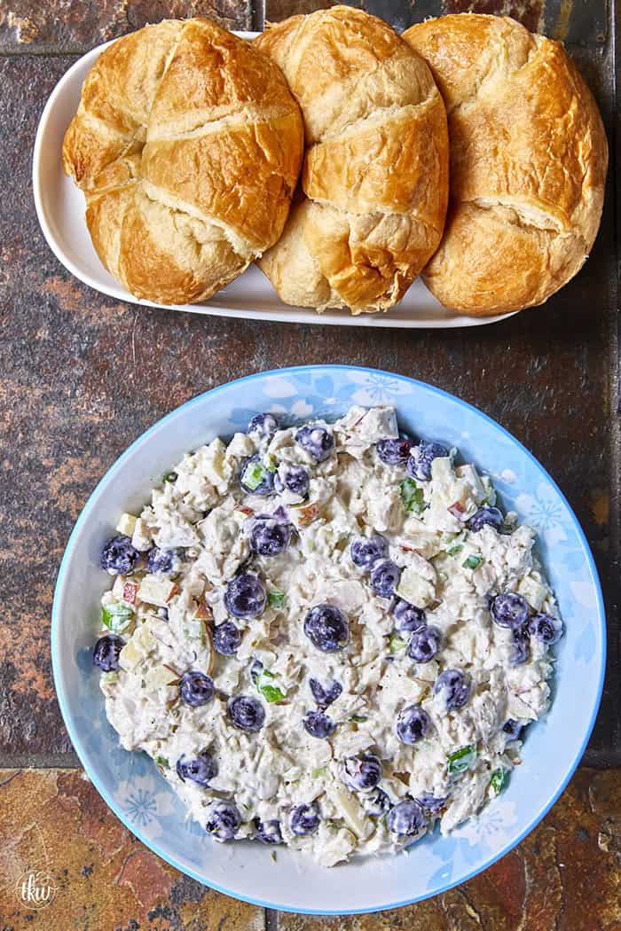 A creamy deli chicken salad packed with tender white meat chicken, sweet fresh blueberries, and crunchy diced apples, accented by shallots, scallions, and celery, all tossed in a seasoned tarragon-mayo dressing brightened with apple cider vinegar.