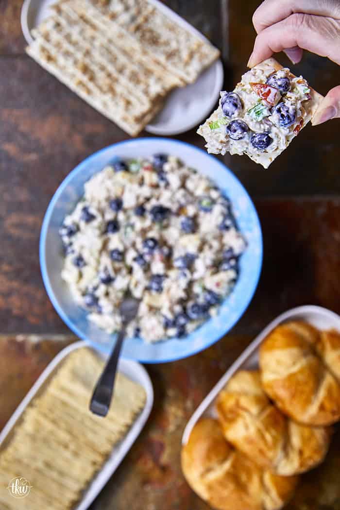 A creamy deli chicken salad packed with tender white meat chicken, sweet fresh blueberries, and crunchy diced apples, accented by shallots, scallions, and celery, all tossed in a seasoned tarragon-mayo dressing brightened with apple cider vinegar.