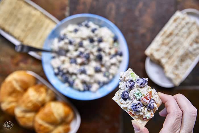 A creamy deli chicken salad packed with tender white meat chicken, sweet fresh blueberries, and crunchy diced apples, accented by shallots, scallions, and celery, all tossed in a seasoned tarragon-mayo dressing brightened with apple cider vinegar.